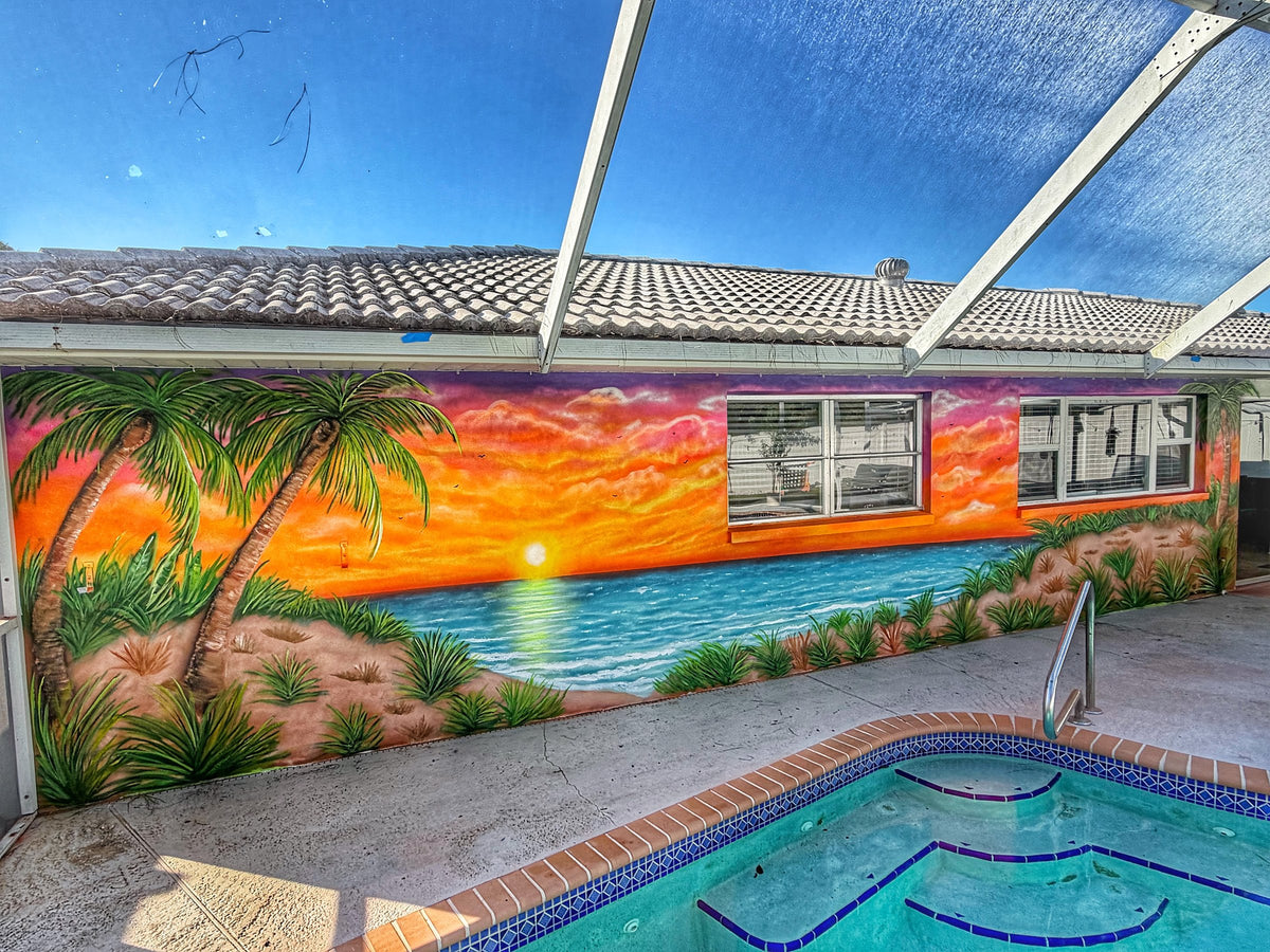Poolside sunset beach mural wrapping a screened lanai